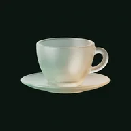 Glass tea cup on a saucer